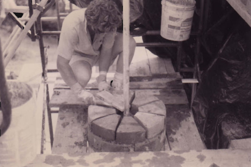 Building the columns — early courses being laid